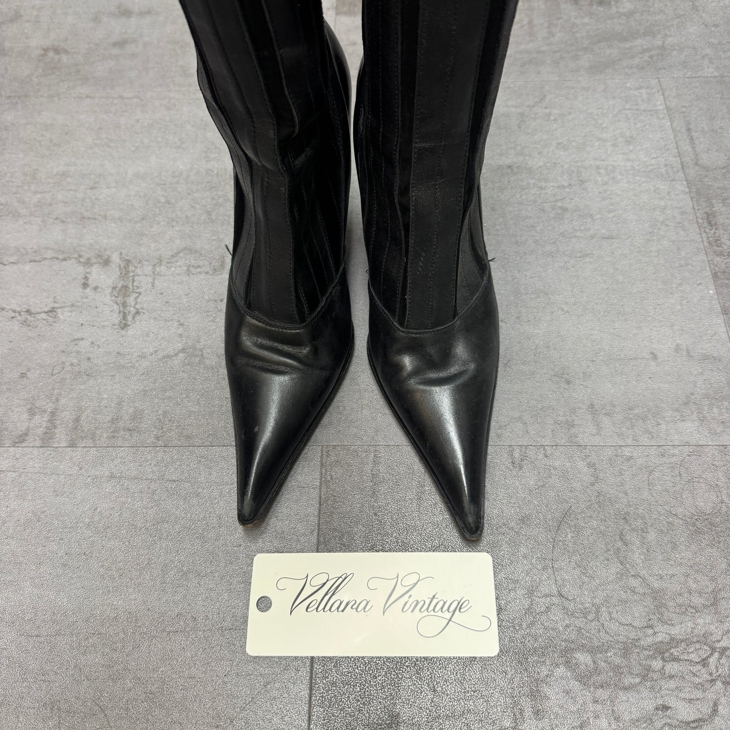 Fluxa Black Leather Paneled Point-Toe Knee High Stiletto Heels