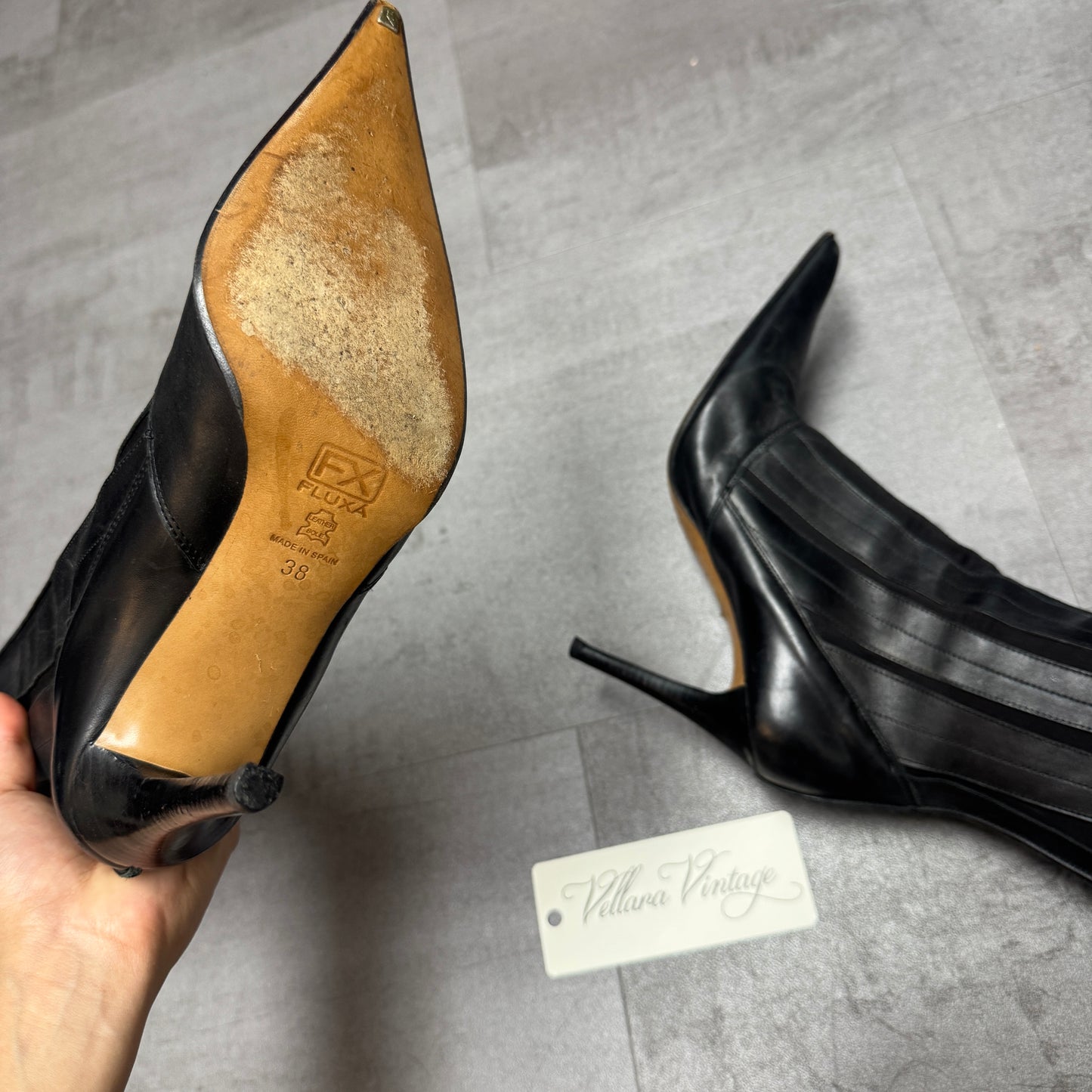 Fluxa Black Leather Paneled Point-Toe Knee High Stiletto Heels