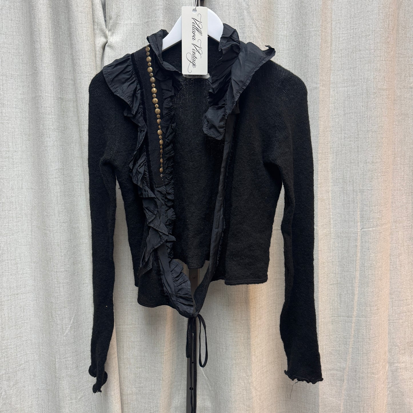 Siste's Black Ruffle Lined Grommet Knit Cardigan w/ Tie
